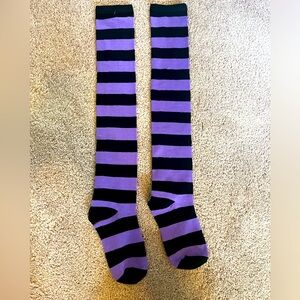Black and purple striped knee-high socks. Women's one size fits all.